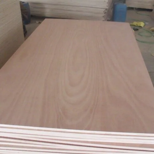 Warm brown woodgrain plywood faces above stacked edges with alternating veneer layers.