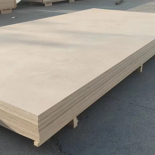 Pale wood-faced plywood sheets stacked on a pallet, with layered edges visible.