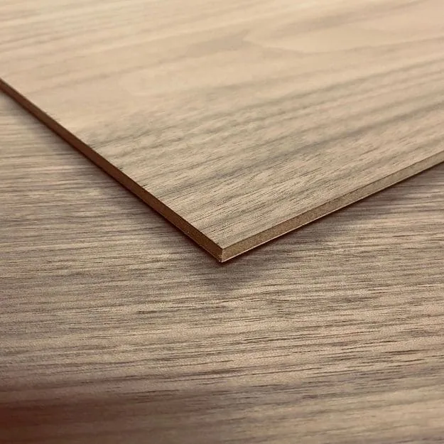 Veneered MDF panel showing a woodgrain face and a brown board edge.