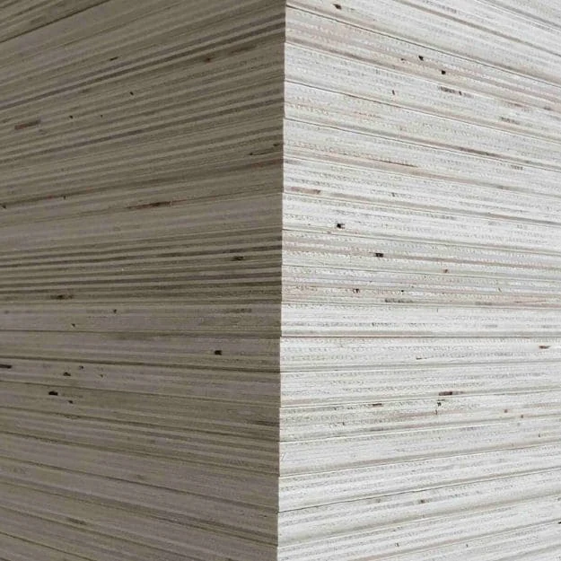 Poplar-core plywood stock showing pale veneer layers at the stacked sheet edges.